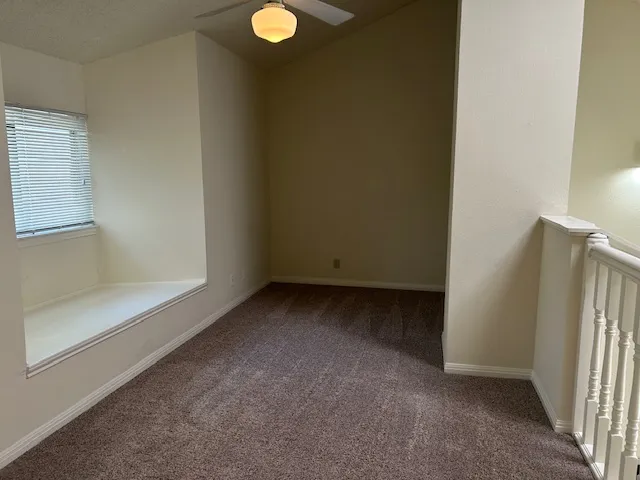 a view of a room with a window