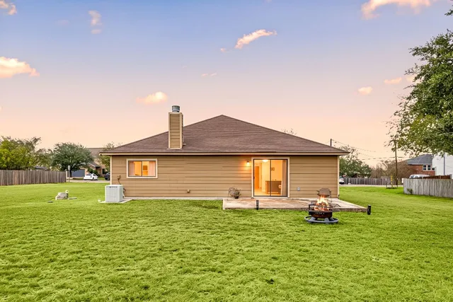 a front view of house with garden