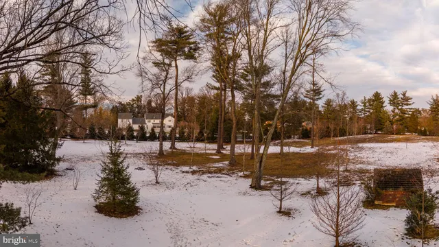an aerial view of residential building and ocean
