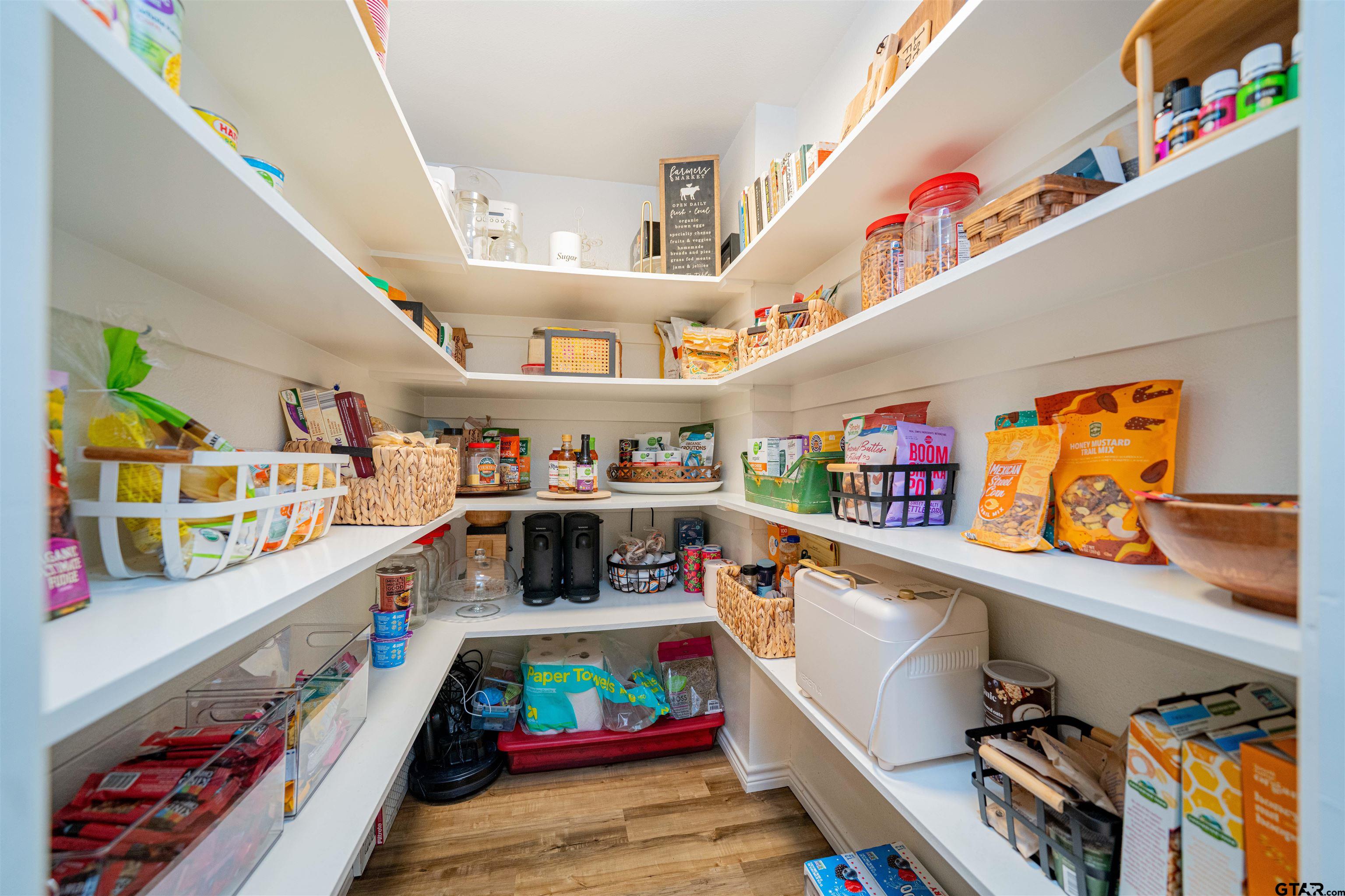 400 Crestview Hughes Springs, TX 75656 - Photo 25 of 32 a utility room with lots of clutter and cabinets