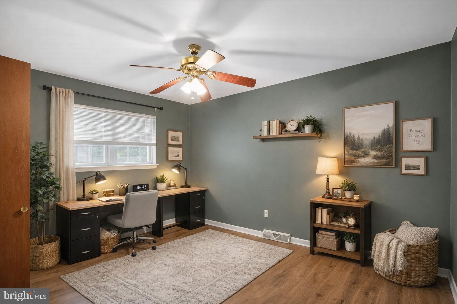 21620 Defender Street Lexington Park, MD 20653 - Photo 6 of 49 a workspace with wooden floor and a window