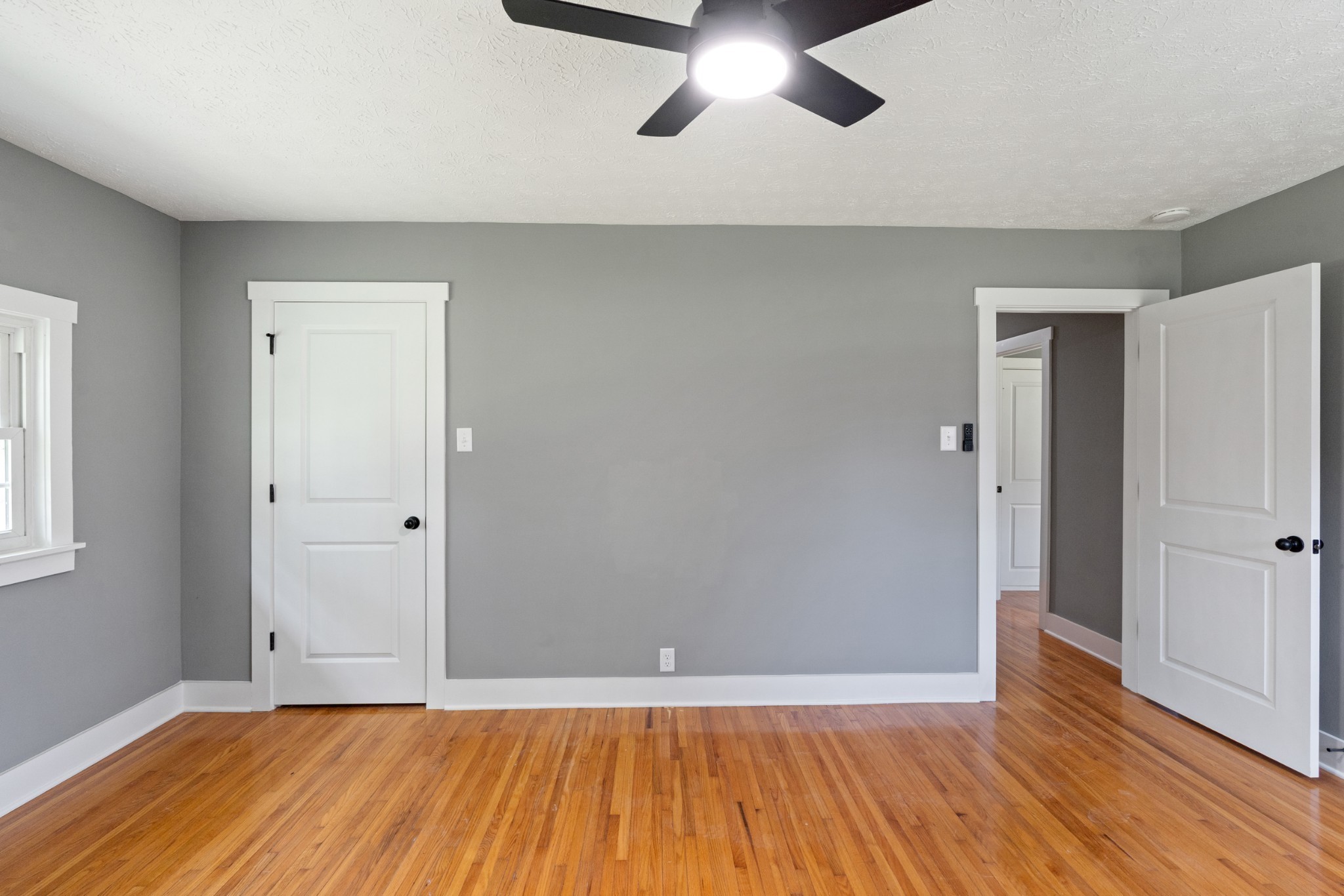 1503 5th Avenue West Springfield, TN 37172 - Photo 23 of 43 an empty room with wooden floor and windows