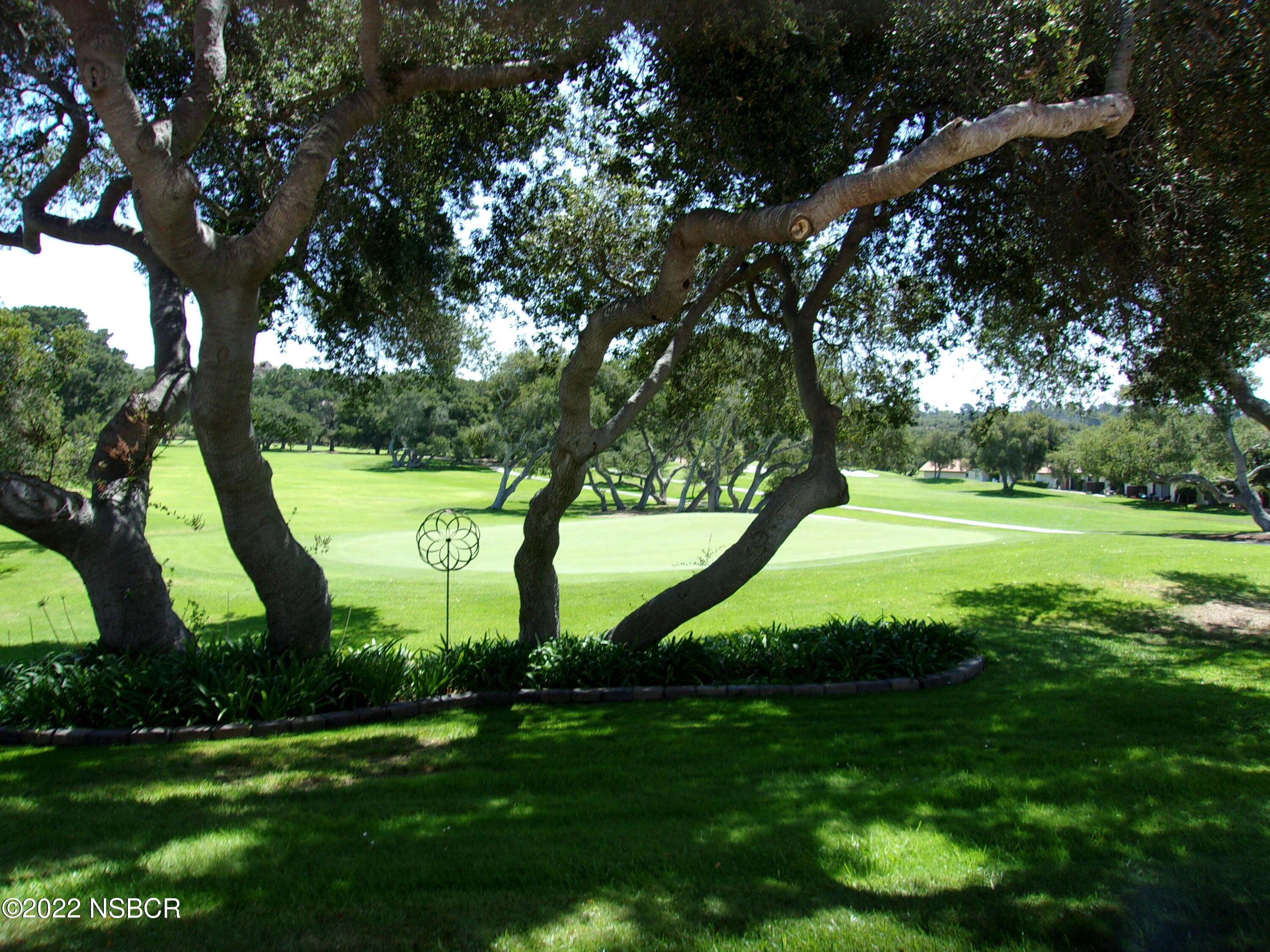 142 Oak Hill Drive Lompoc, CA 93436 - Photo 2 of 23 a view of a park with large trees