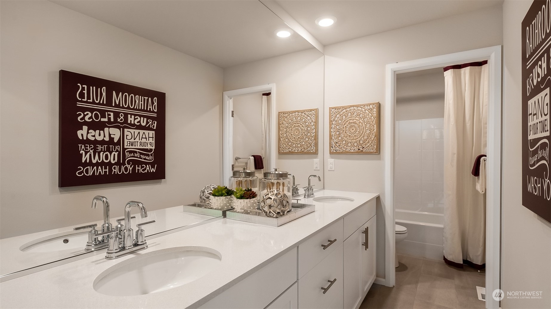 4010 233rd Street Southeast, Unit 78 Bothell, WA 98021 - Photo 13 of 18 a bathroom with a sink double vanity and a shower