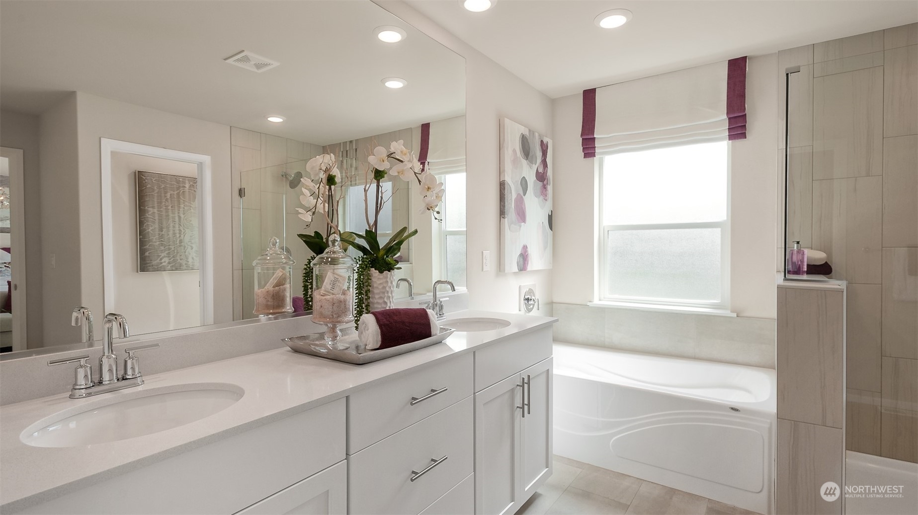 4010 233rd Street Southeast, Unit 78 Bothell, WA 98021 - Photo 18 of 18 a bathroom with a double vanity sink and a bathtub