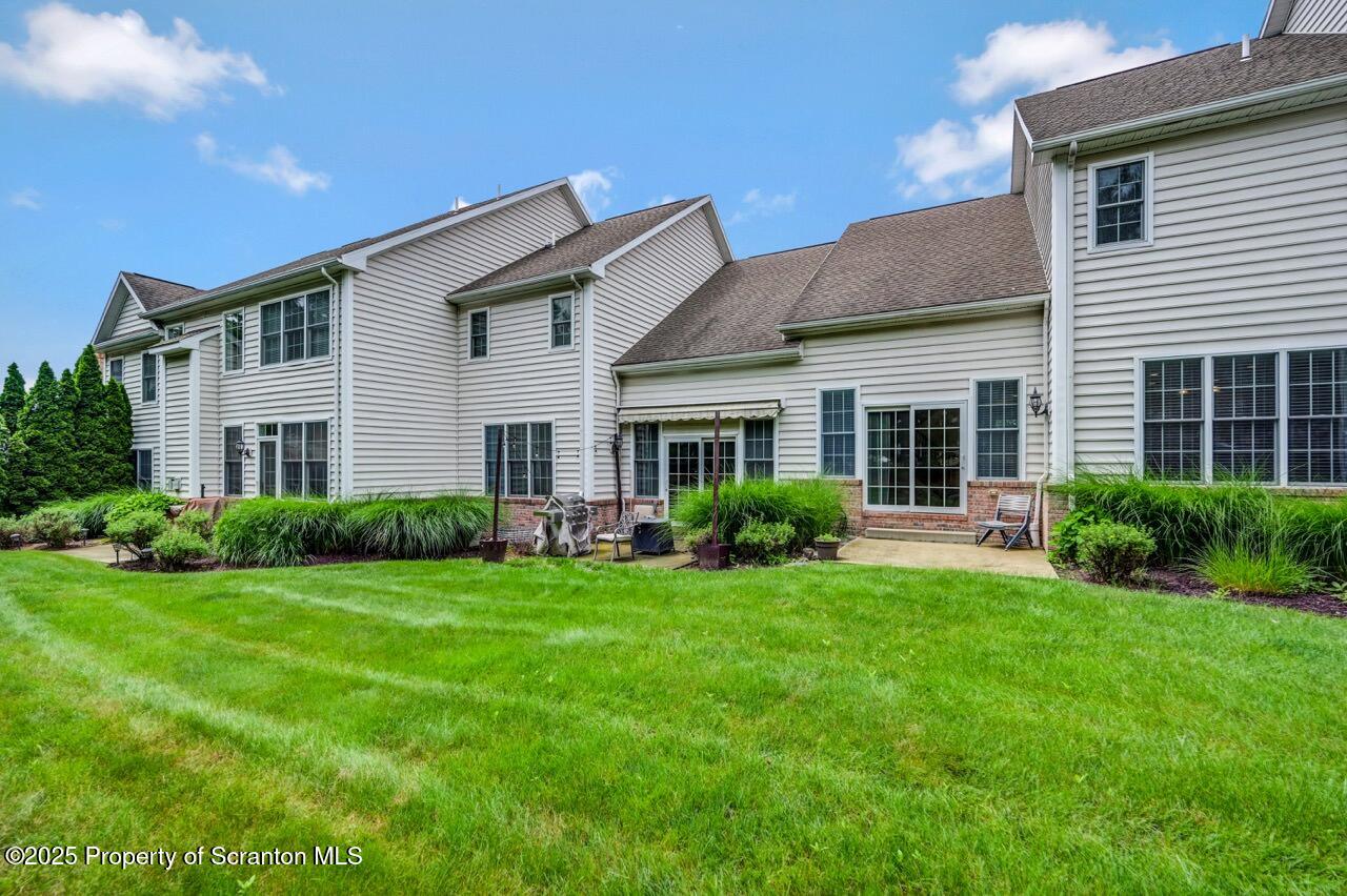 2303 Browning Cl Moosic, PA 18507 - Photo 3 of 71 a front view of a house and garden