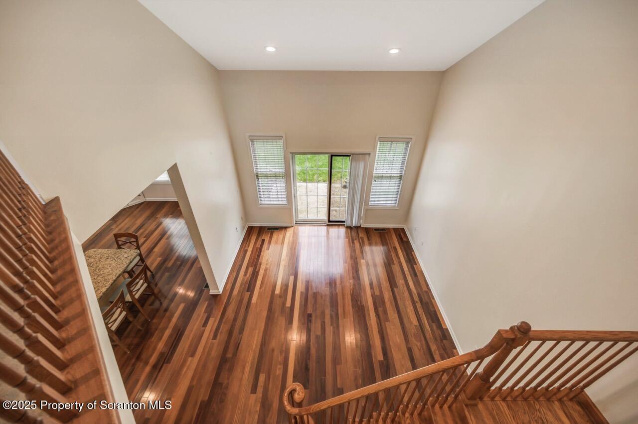 2303 Browning Cl Moosic, PA 18507 - Photo 33 of 71 a view of a room with wooden floor and windows