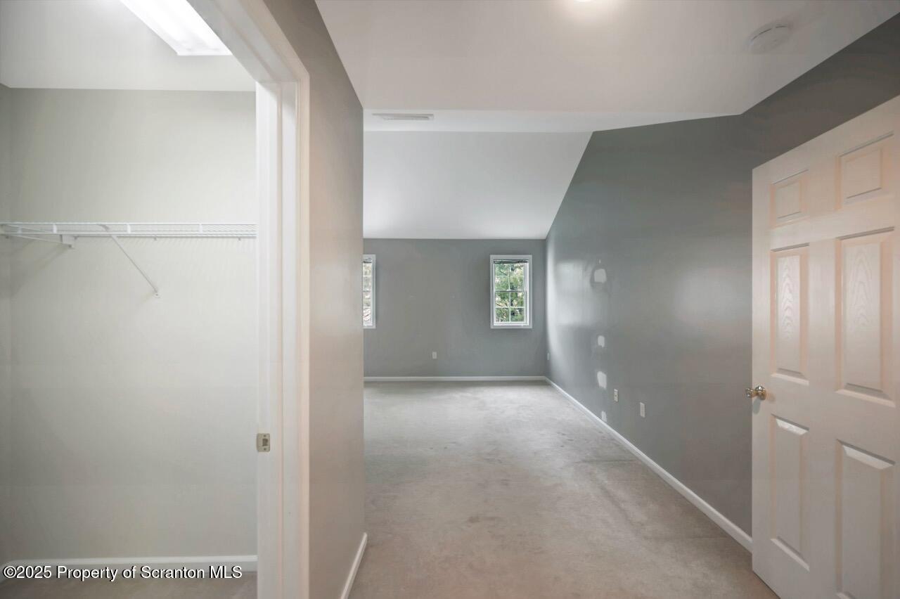 2303 Browning Cl Moosic, PA 18507 - Photo 34 of 71 a view of a hallway with an empty room