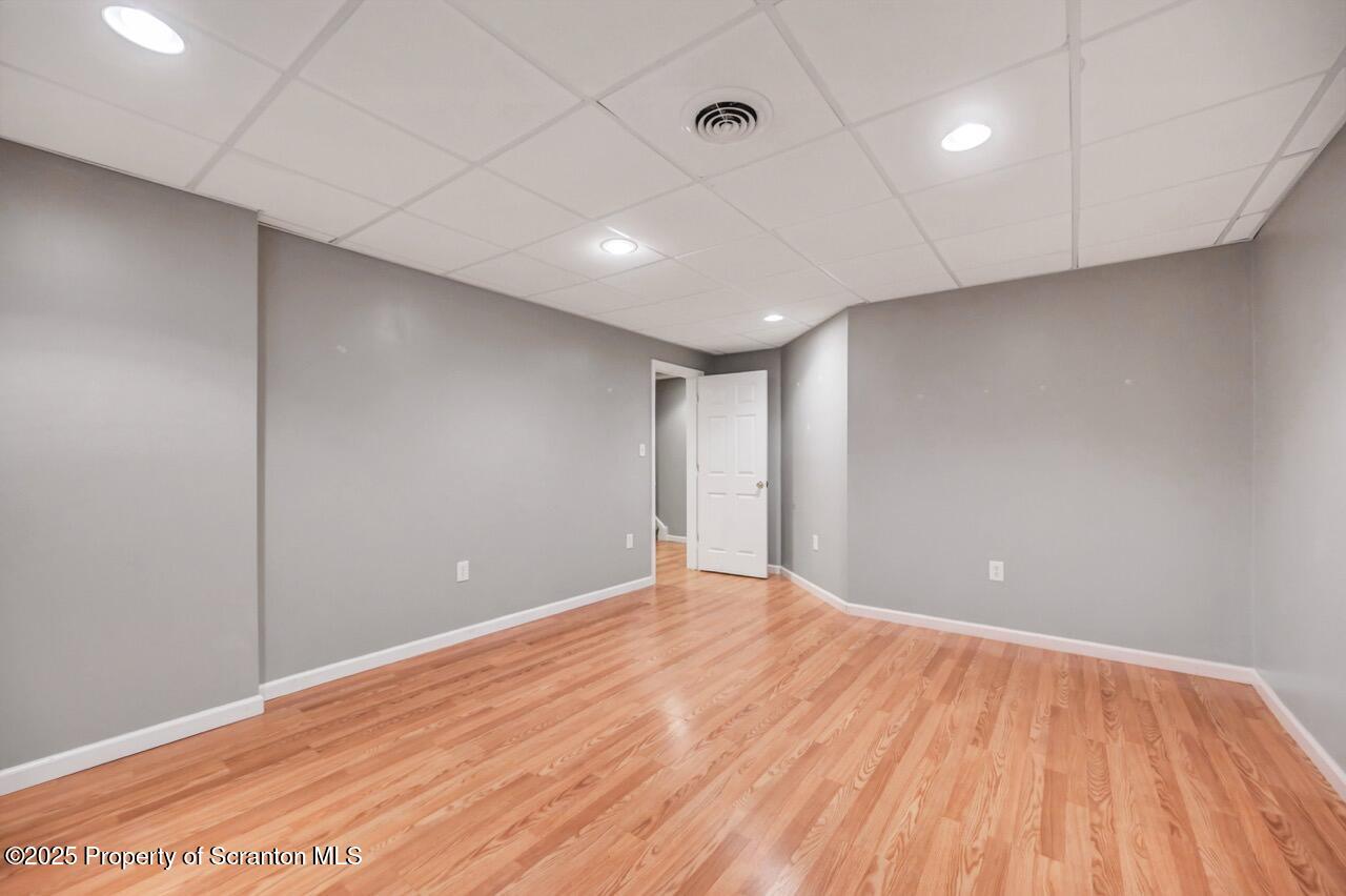 2303 Browning Cl Moosic, PA 18507 - Photo 56 of 71 a view of empty room with wooden floor
