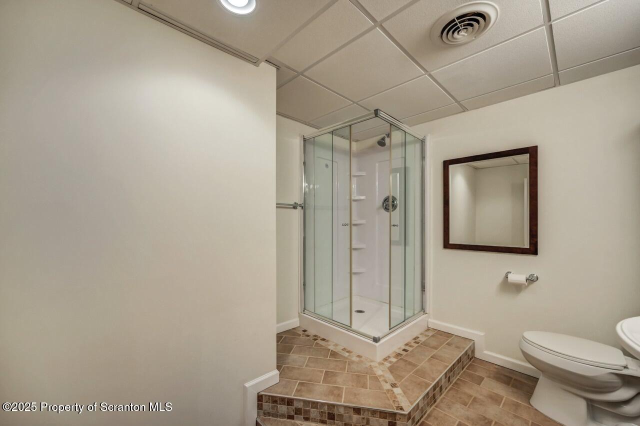2303 Browning Cl Moosic, PA 18507 - Photo 58 of 71 a bathroom with a toilet and a shower