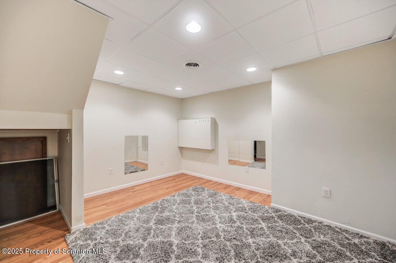 2303 Browning Cl Moosic, PA 18507 - Photo 62 of 71 a spacious bedroom with a bed and a dresser