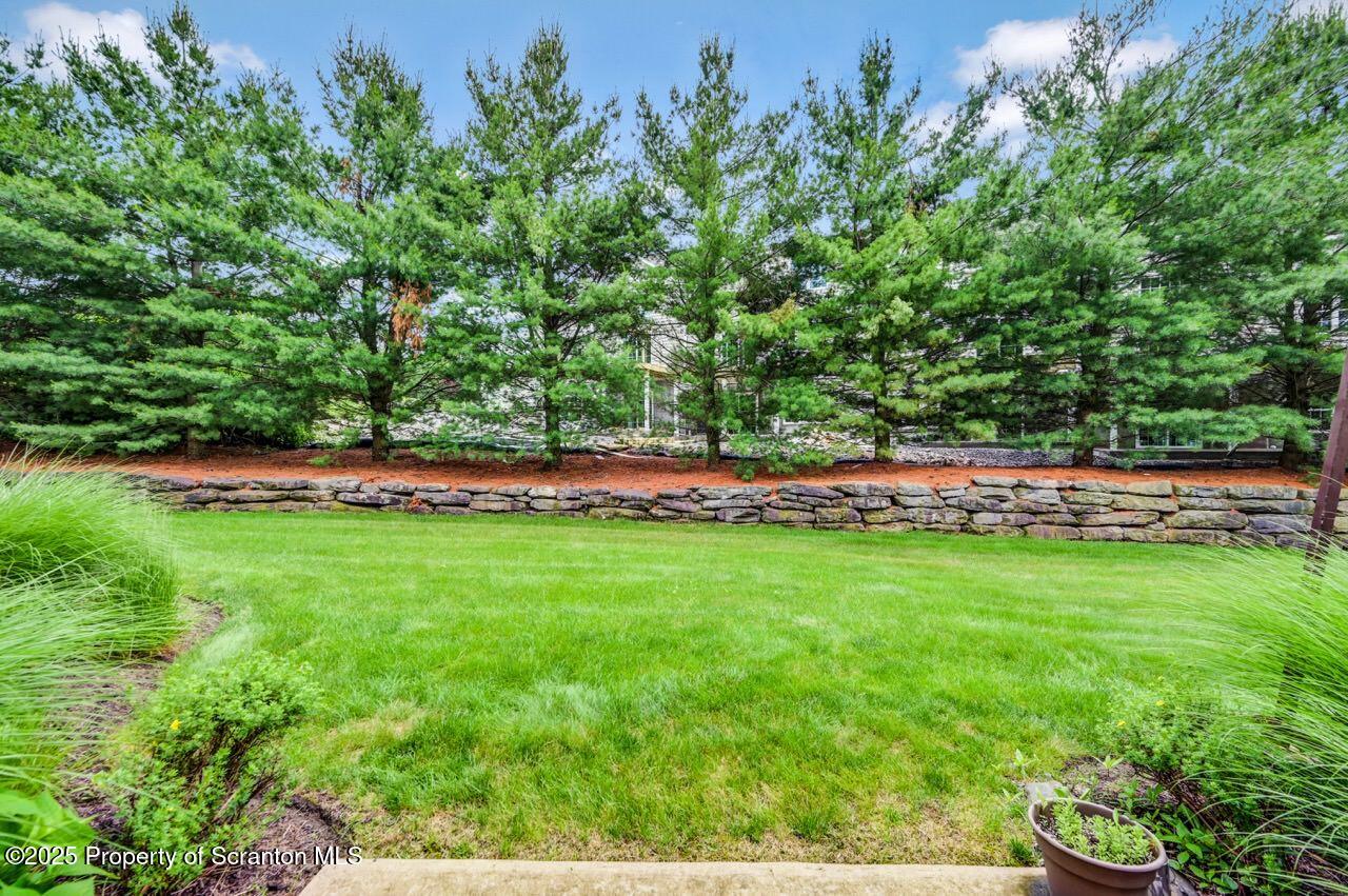 2303 Browning Cl Moosic, PA 18507 - Photo 68 of 71 a view of yard with grass and trees