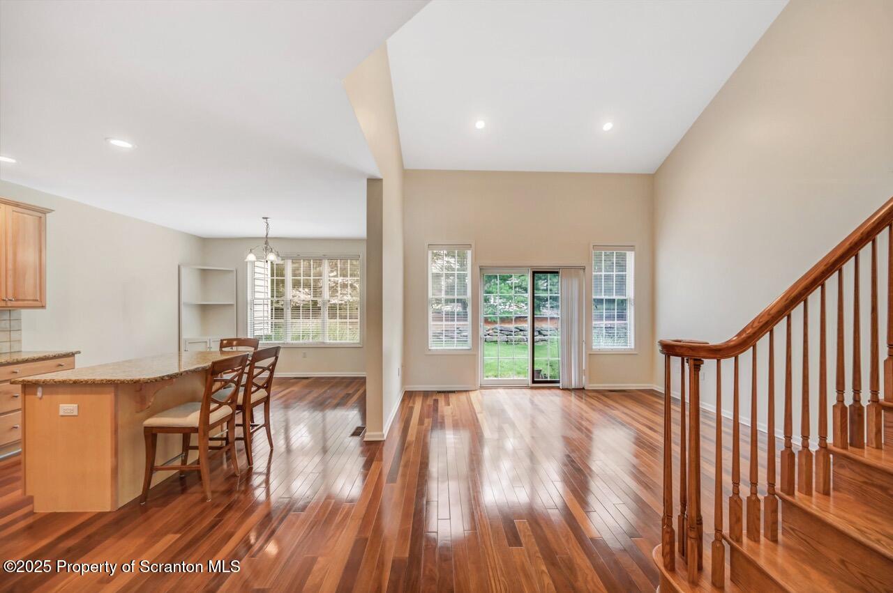 2303 Browning Cl Moosic, PA 18507 - Photo 7 of 71 a view of a dining room with furniture wooden floor and chandelier