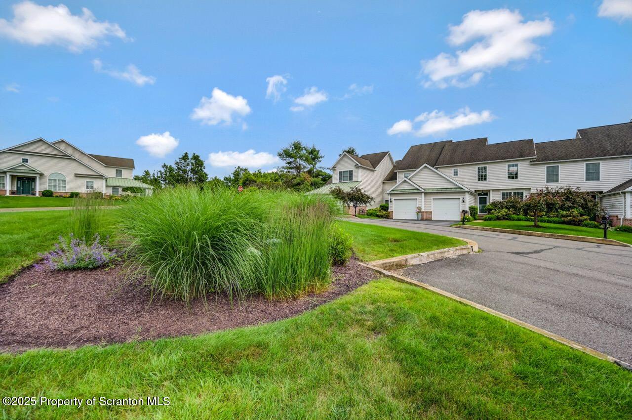 2303 Browning Cl Moosic, PA 18507 - Photo 71 of 71 a view of a house with a big yard and potted plants