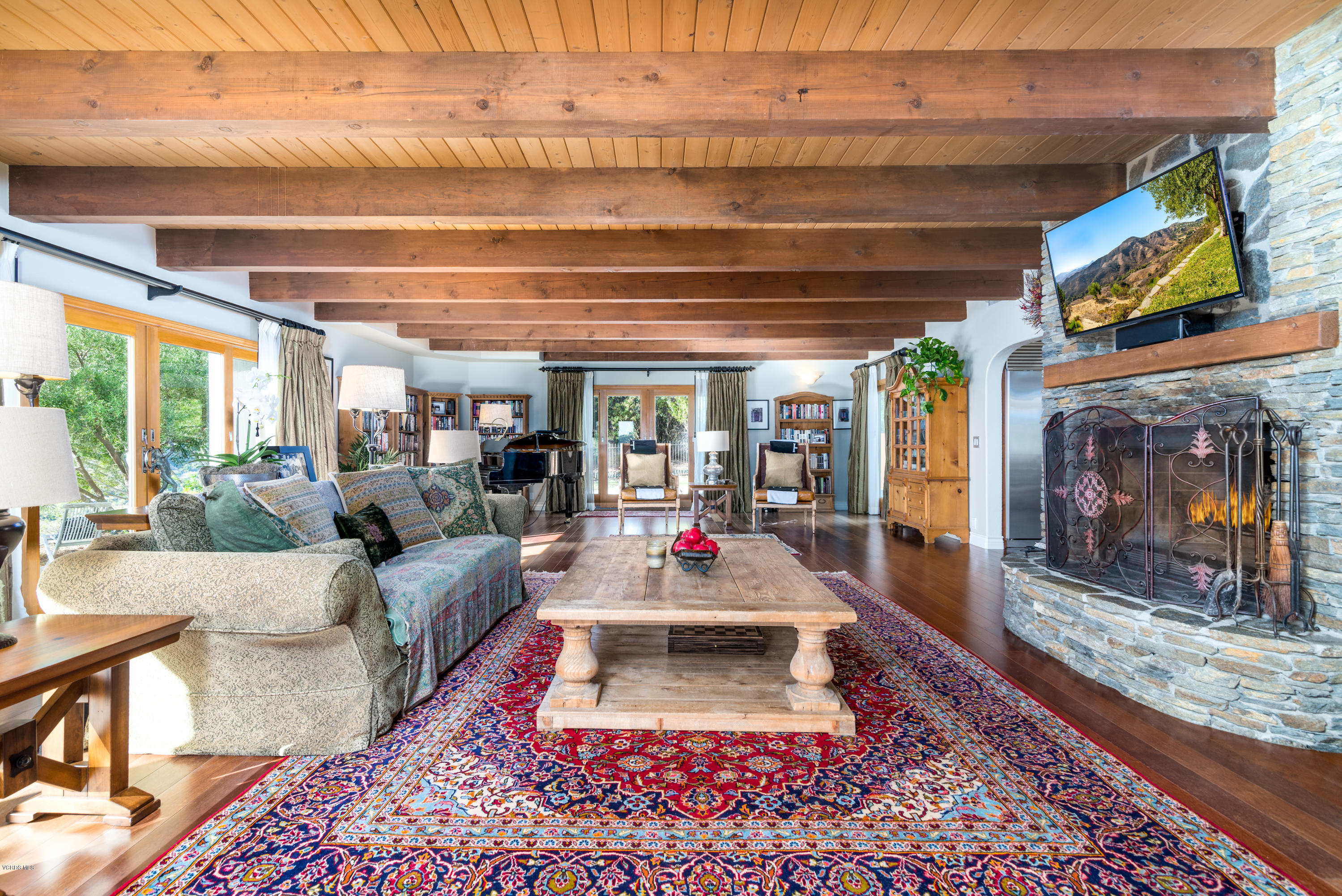 24353 Dry Canyon Cold Creek Road Calabasas, CA 91302 - Photo 12 of 36 a living room with fireplace furniture and a fireplace