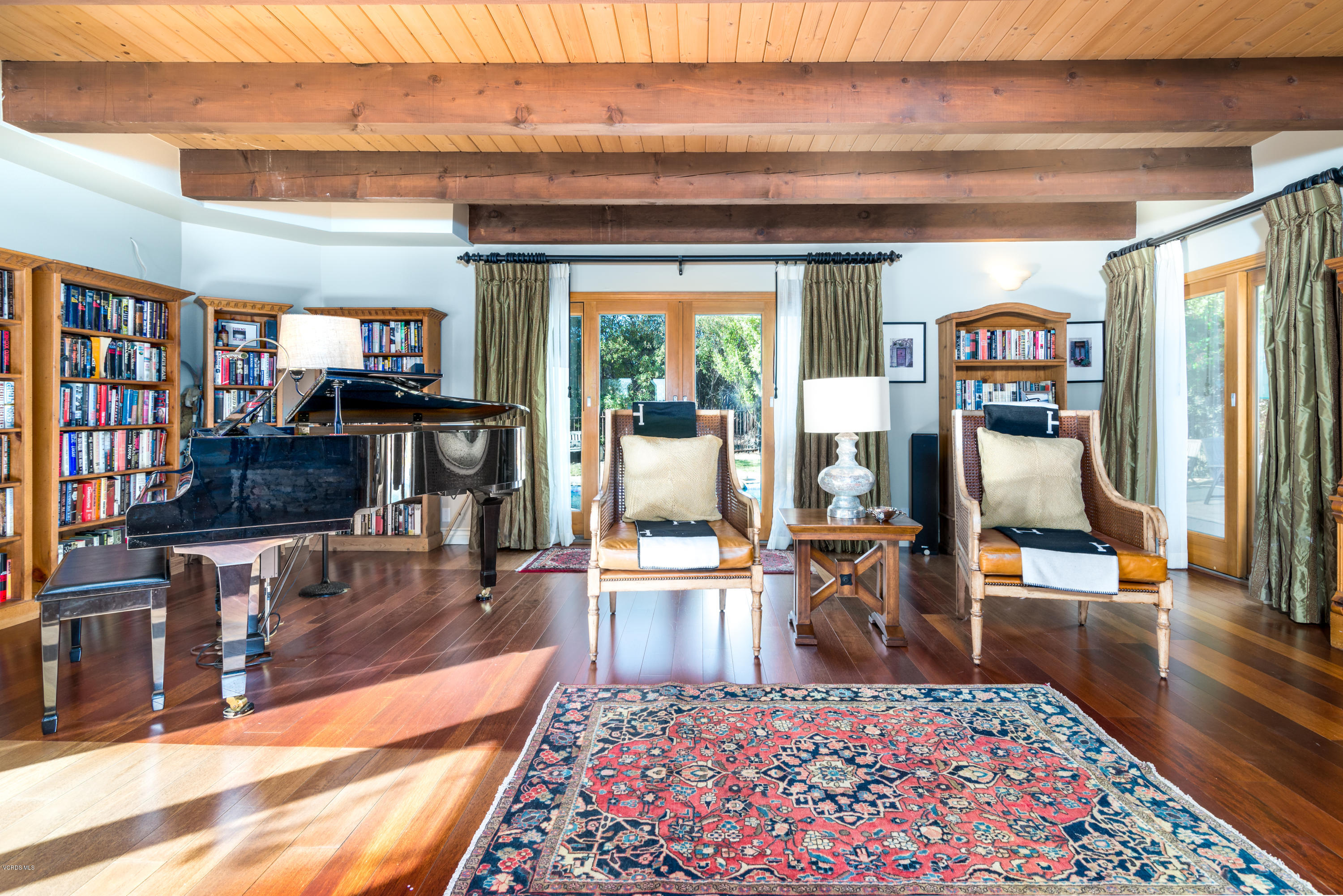 24353 Dry Canyon Cold Creek Road Calabasas, CA 91302 - Photo 14 of 36 a living room with furniture and a rug