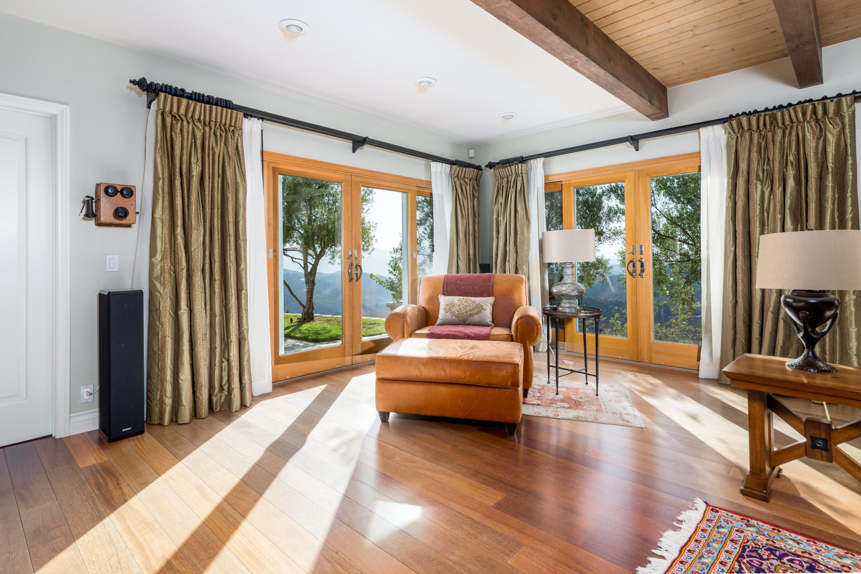 24353 Dry Canyon Cold Creek Road Calabasas, CA 91302 - Photo 15 of 36 a living room with furniture and a large window