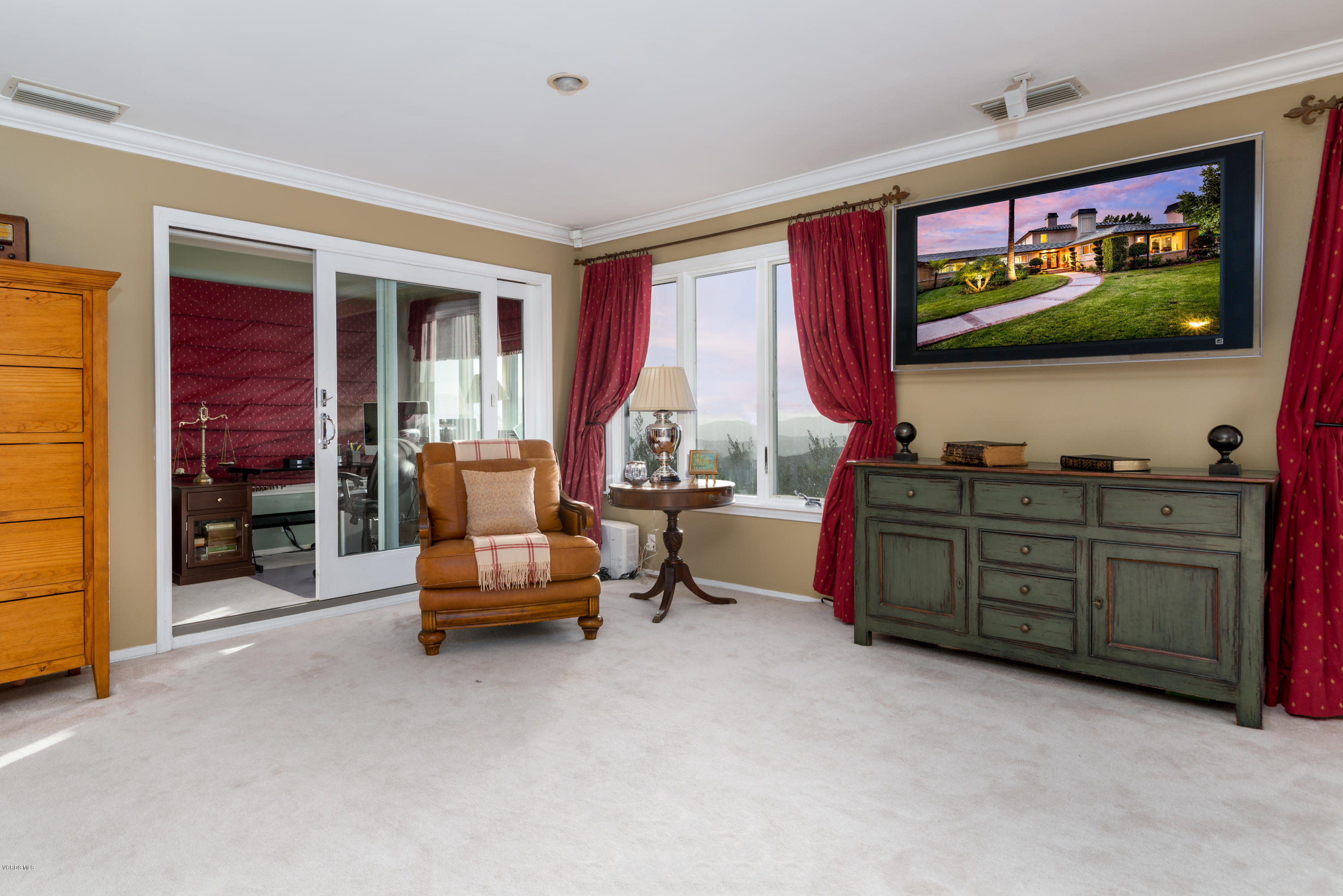 24353 Dry Canyon Cold Creek Road Calabasas, CA 91302 - Photo 24 of 36 a living room with furniture and a flat screen tv