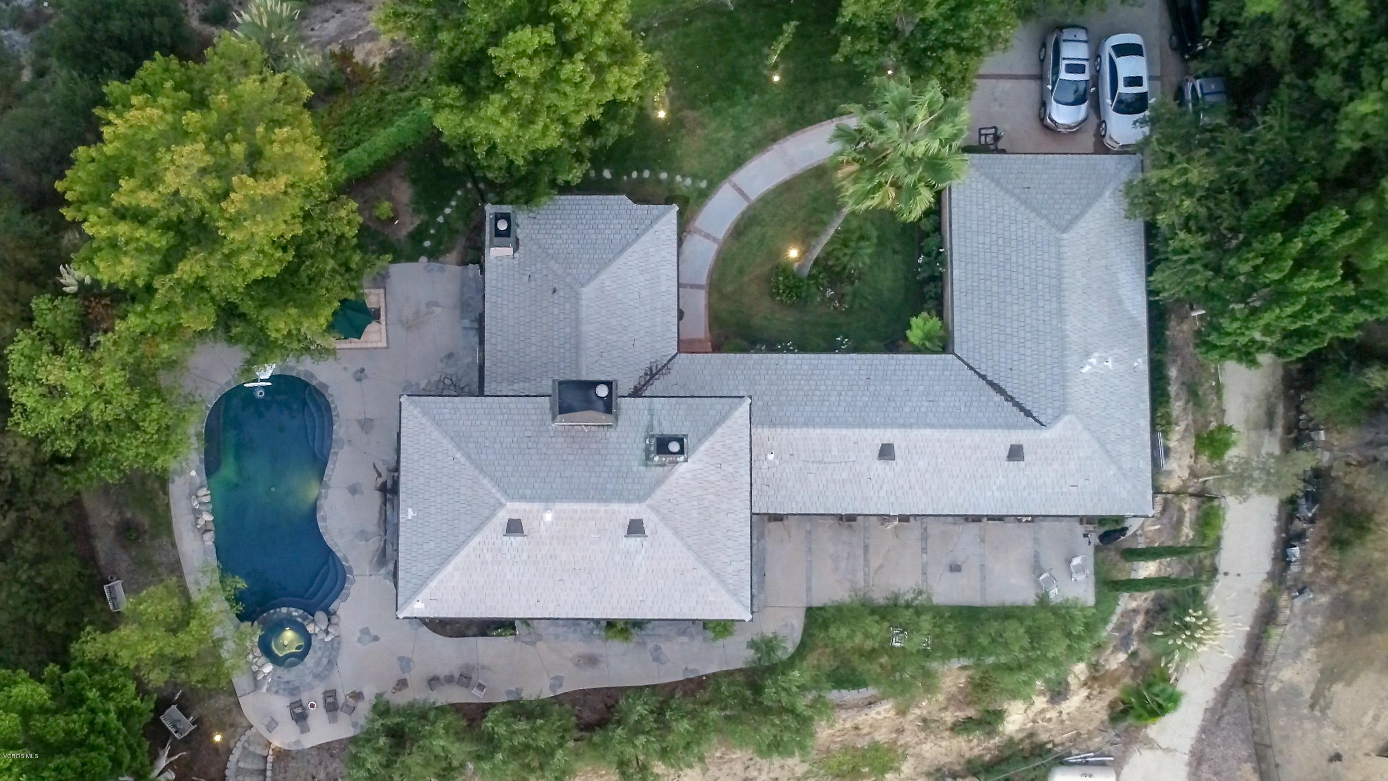 24353 Dry Canyon Cold Creek Road Calabasas, CA 91302 - Photo 27 of 36 an aerial view of a house with a yard and trees