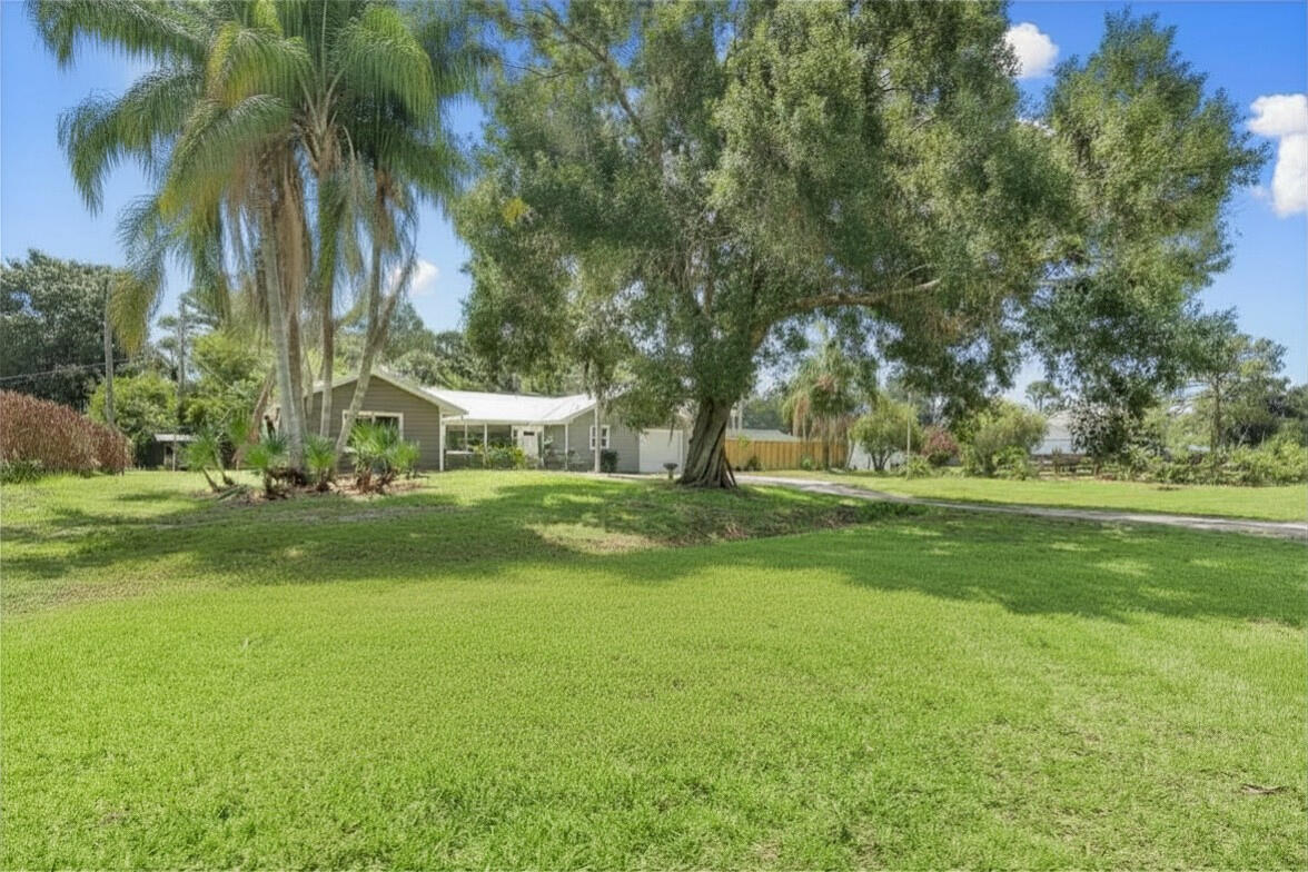 202 Laidback Way Fort Pierce, FL 34945 - Photo 6 of 37 long exterior front