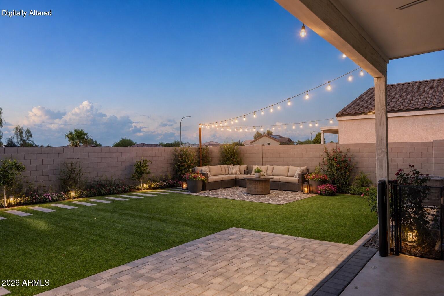 2548 West Grenadine Road Phoenix, AZ 85041 - Photo 29 of 31 Backyard Evening