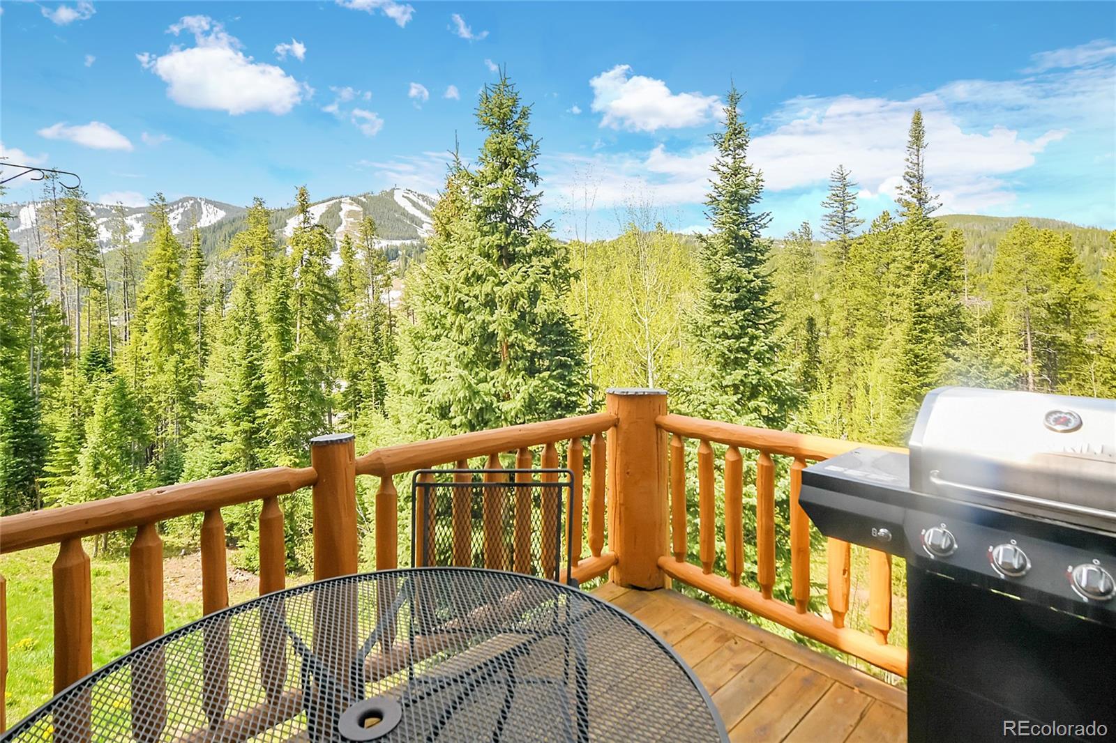 203 Antler Way, Unit 2203 Winter Park, CO 80482 - Photo 20 of 44 a view of a balcony with chairs