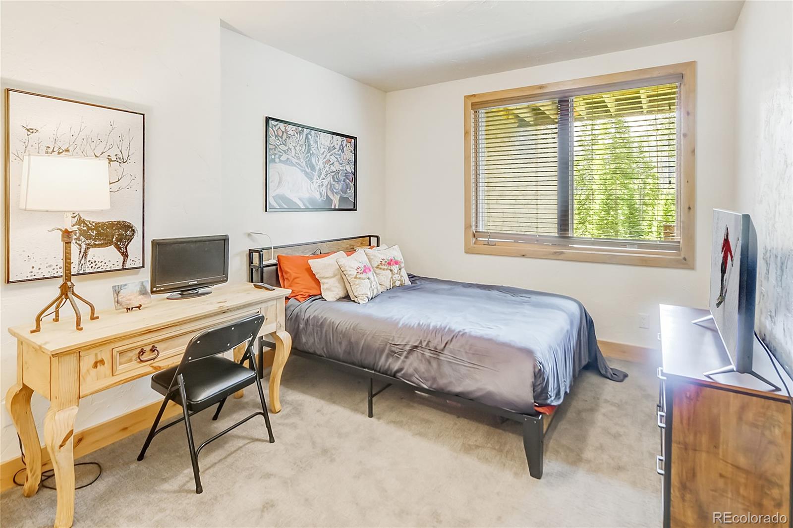 203 Antler Way, Unit 2203 Winter Park, CO 80482 - Photo 31 of 44 a bedroom with furniture and a window