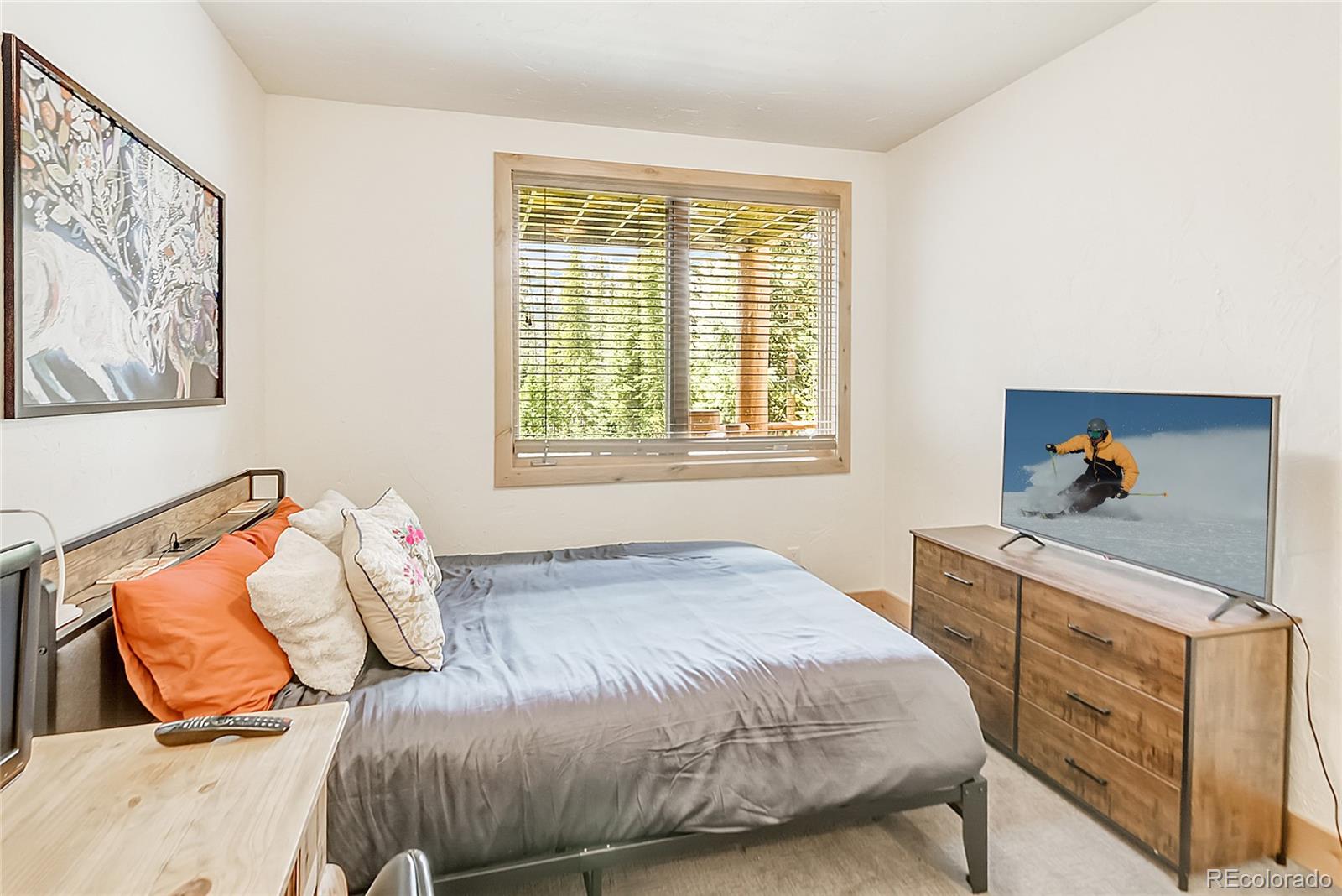 203 Antler Way, Unit 2203 Winter Park, CO 80482 - Photo 33 of 44 a bedroom with a bed and window