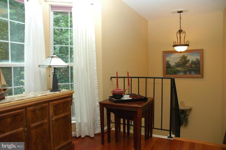 8303 Southstream Run Springfield, VA 22153 - Photo 17 of 30 Living Room/Dining Room