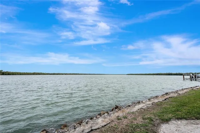 a view of a lake with houses