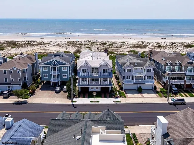 a view of city with ocean