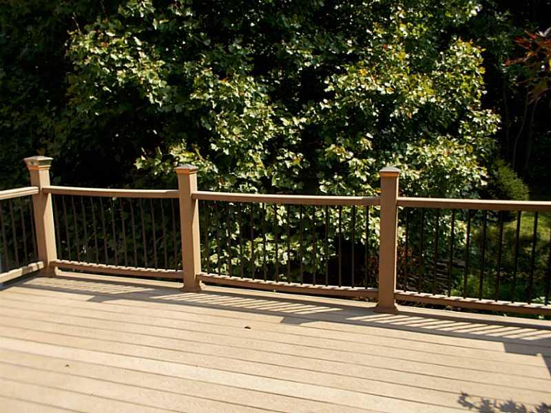 8918 Highland Road Pittsburgh, PA 15237 - Photo 23 of 25 Patio/Deck. Wooded rear yard with no maintenance composite deck and solar lights.