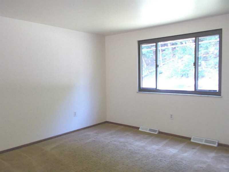 Living Room. Open living and dining room and kitchen!  Freshly painted!  Carpets just cleaned!