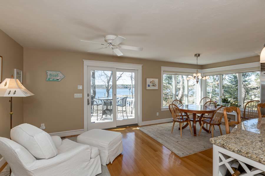 99 Monomoscoy Road West Mashpee, MA 02649 - Photo 12 of 43 a living room with furniture and wooden floor