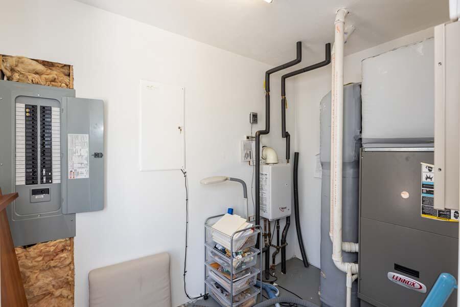 99 Monomoscoy Road West Mashpee, MA 02649 - Photo 30 of 43 a bathroom with a tub shower and a sink