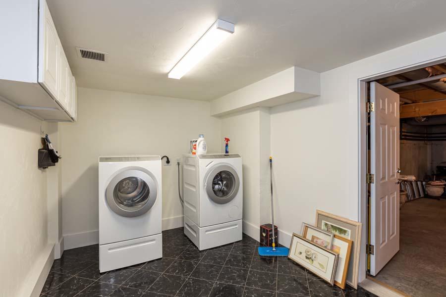 99 Monomoscoy Road West Mashpee, MA 02649 - Photo 31 of 43 a utility room with dryer and washer