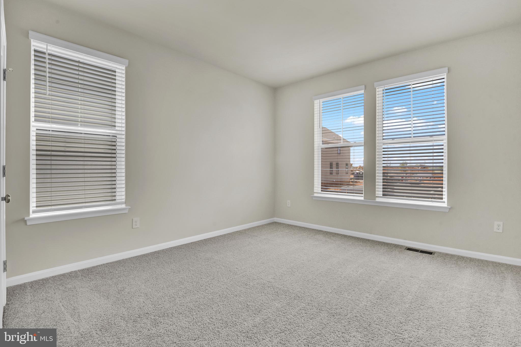 462 Herringbone Way Frederick, MD 21701 - Photo 12 of 29 a view of an empty room with a window