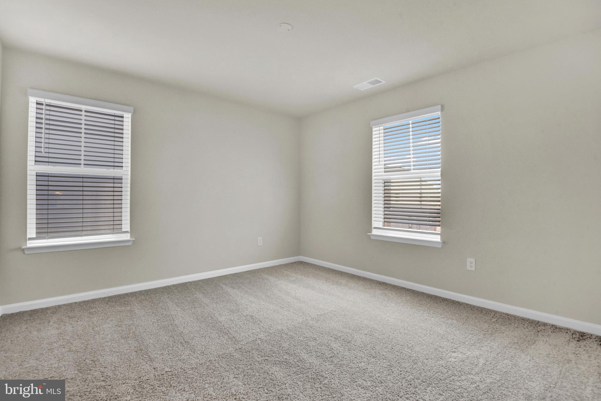 462 Herringbone Way Frederick, MD 21701 - Photo 14 of 29 a view of an empty room with a window