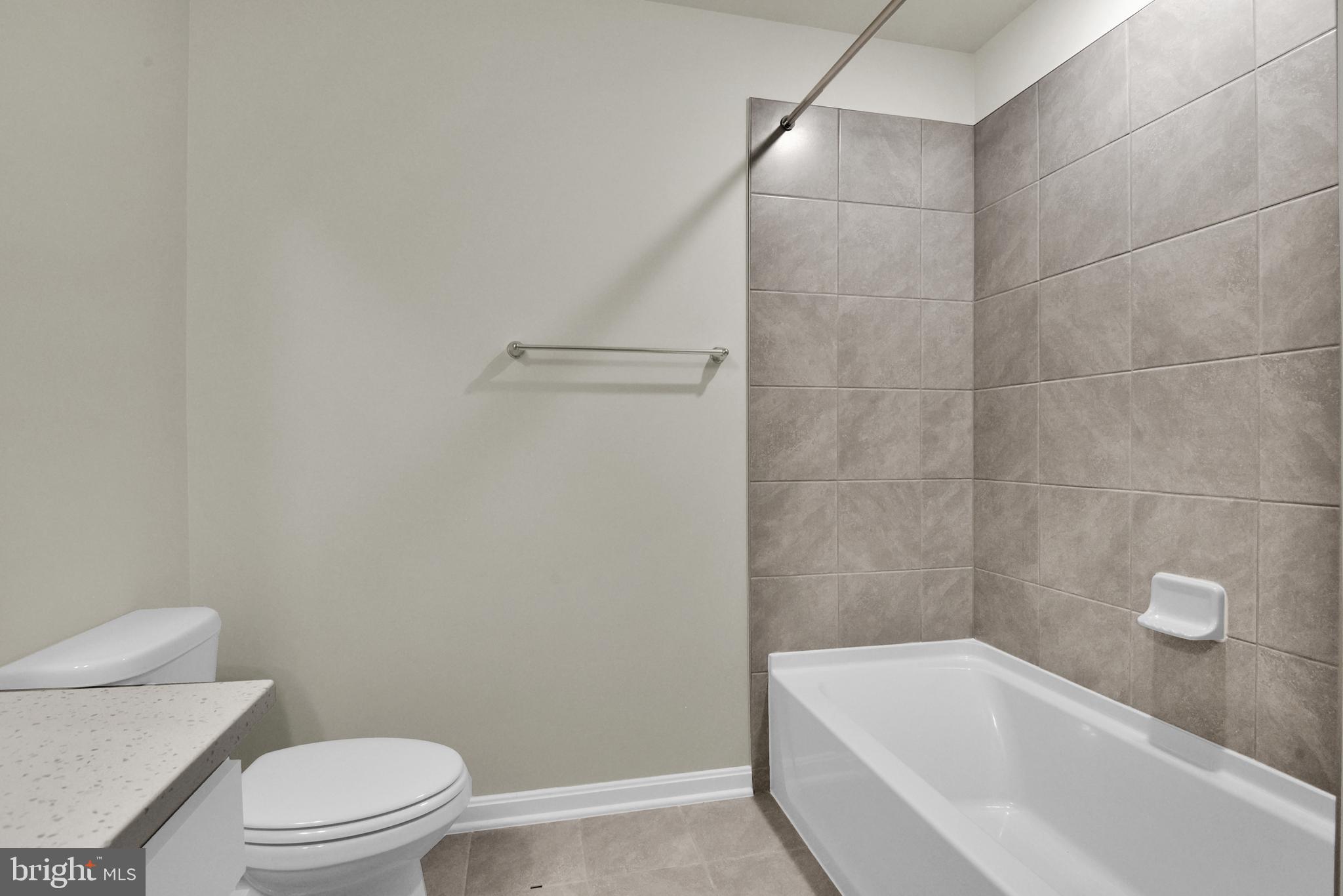 462 Herringbone Way Frederick, MD 21701 - Photo 17 of 29 a bathroom with a bathtub and toilet