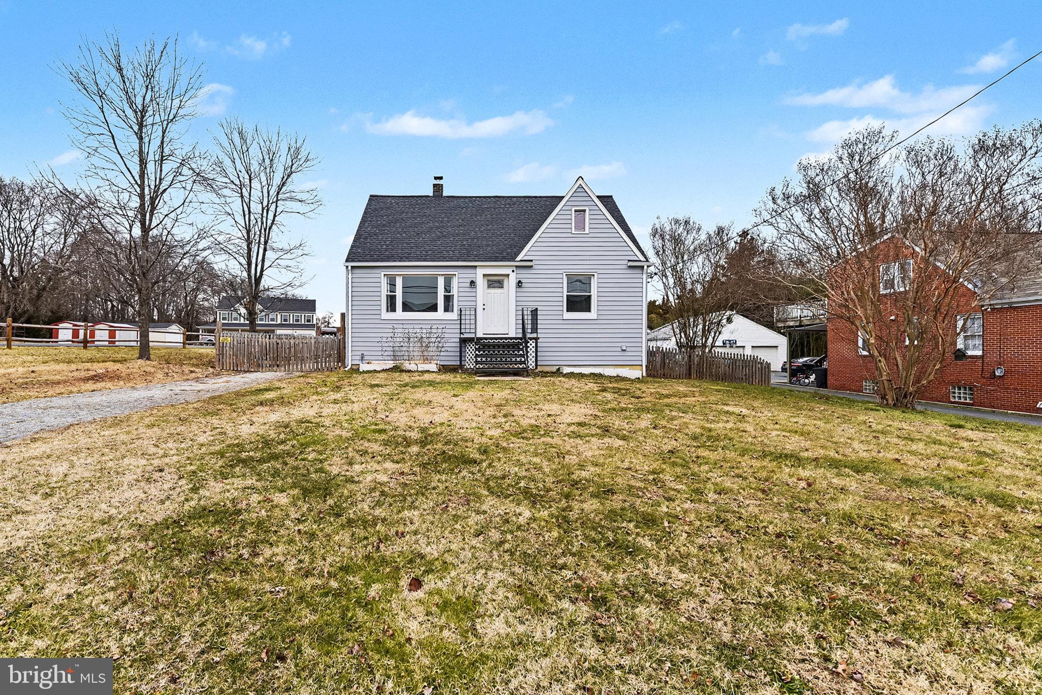 4818 Ridge Road Rosedale, MD 21237 - Photo 2 of 30 a view of a house with a yard