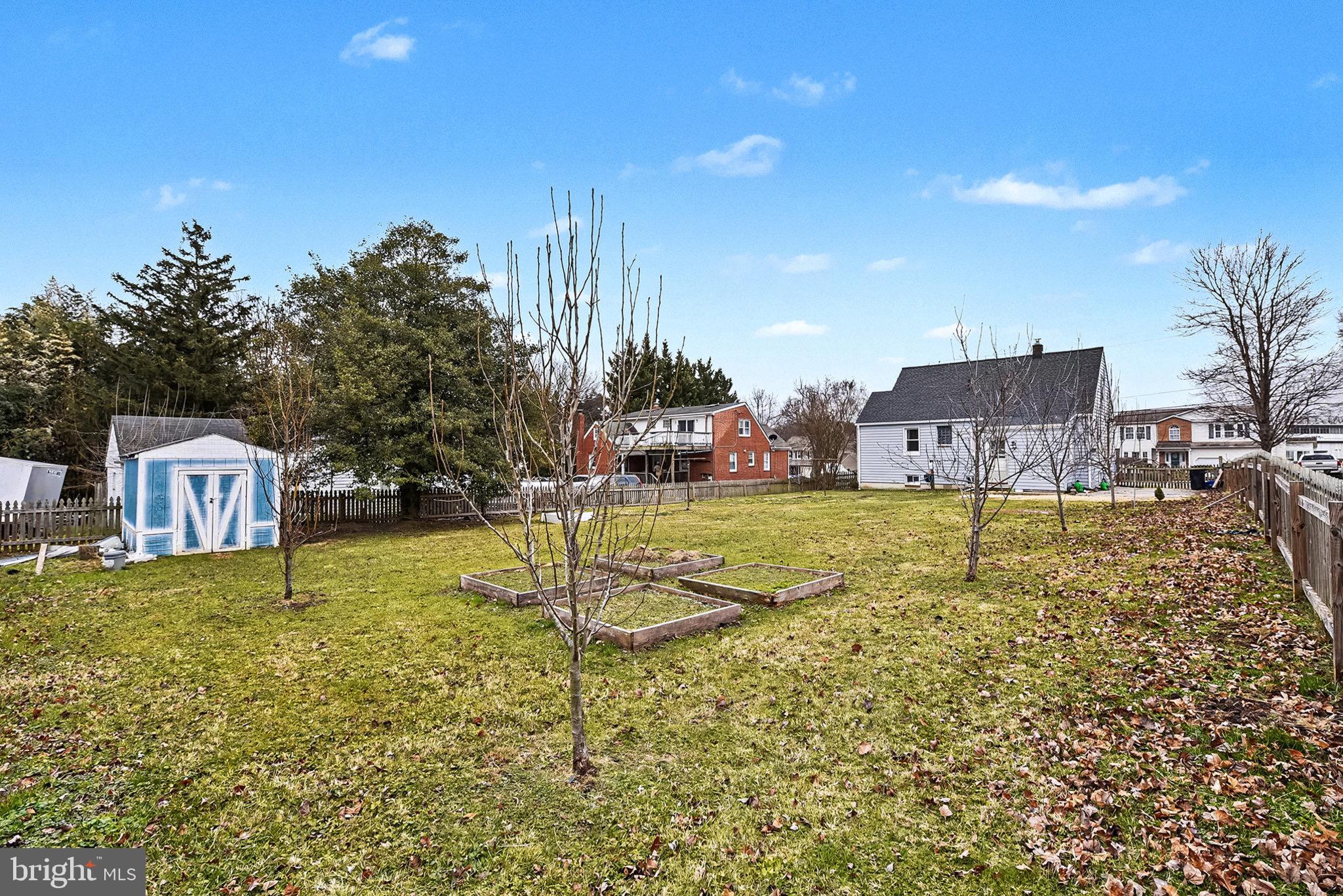 4818 Ridge Road Rosedale, MD 21237 - Photo 26 of 30 a view of a house with a yard