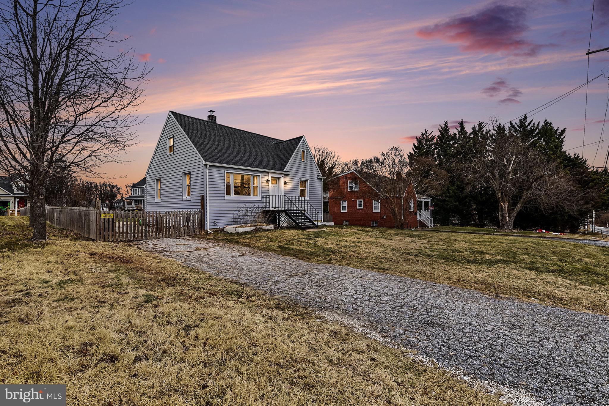 4818 Ridge Road Rosedale, MD 21237 - Photo 4 of 30 a view of a house with a yard