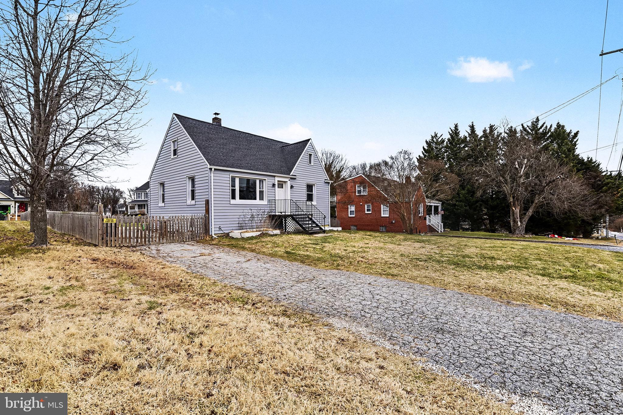 4818 Ridge Road Rosedale, MD 21237 - Photo 5 of 30 a view of a house with a yard