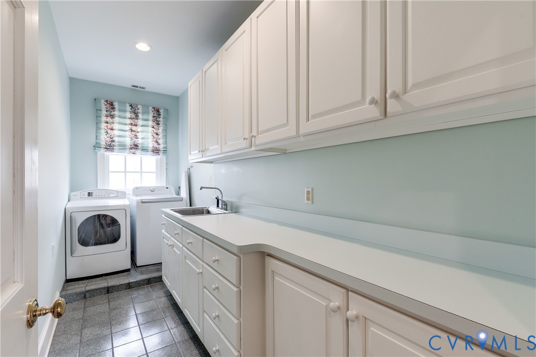 1281 Shallow Well Road Manakin-Sabot, VA 23103 - Photo 43 of 67 Great laundry space with ample storage! Sink and f