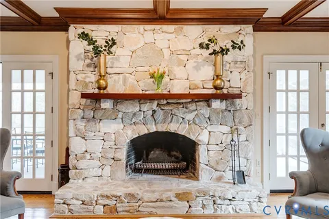 a kitchen with stainless steel appliances granite countertop a refrigerator a stove a sink and a microwave