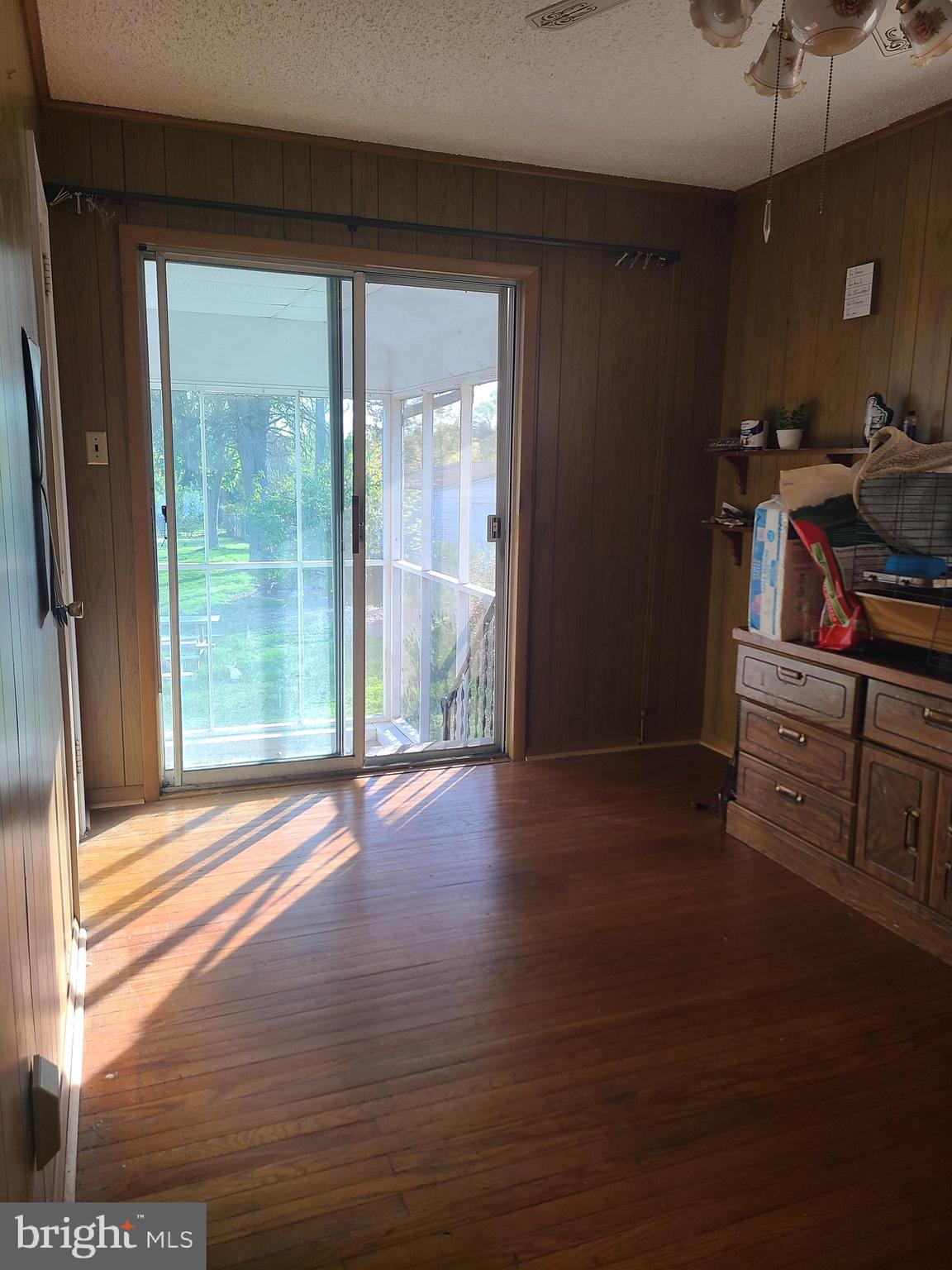 4912 Shepherd Street Brookhaven, PA 19015 - Photo 5 of 12 a view of empty room with wooden floor