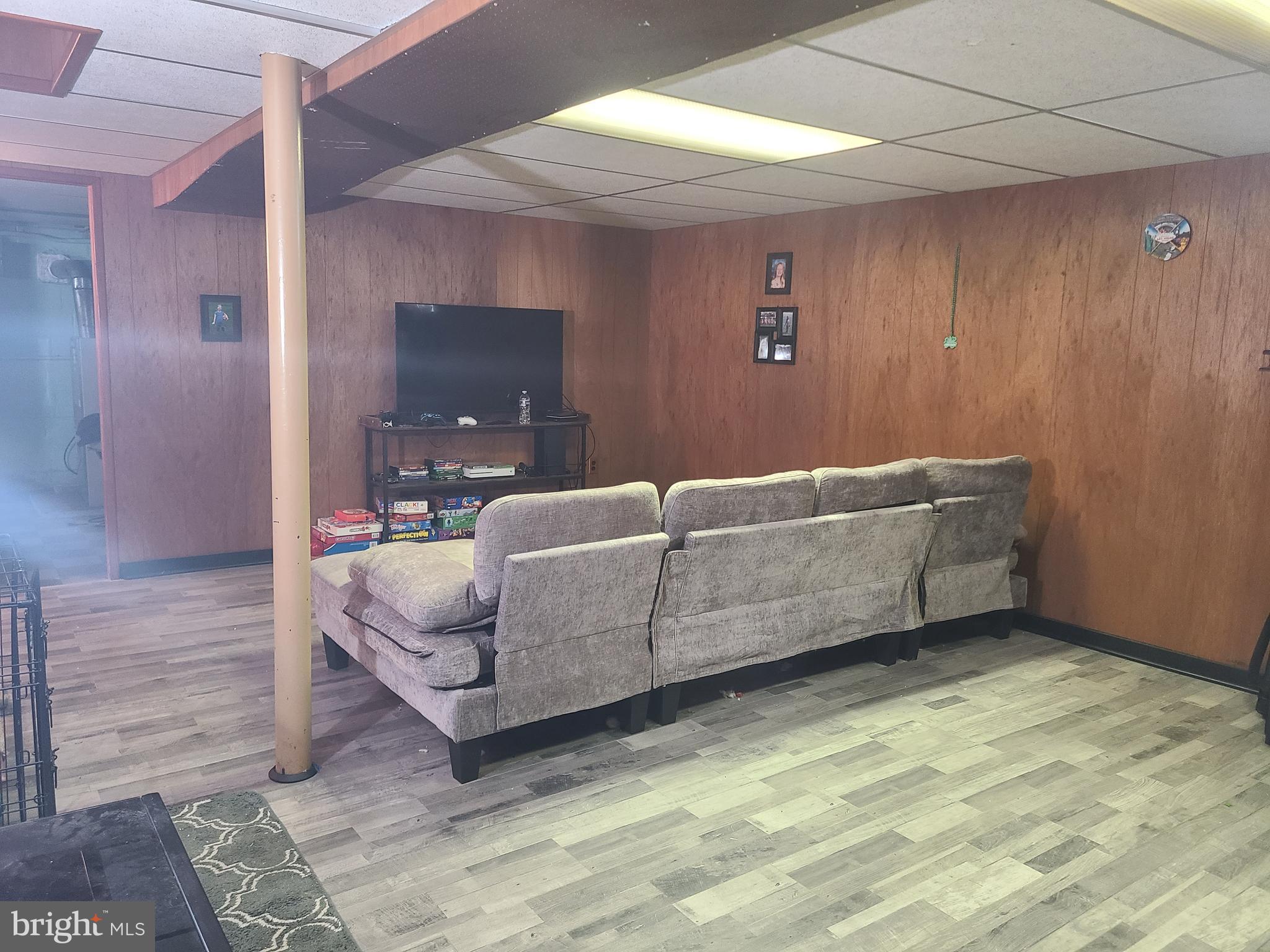 4912 Shepherd Street Brookhaven, PA 19015 - Photo 7 of 12 a living room with couches and painted walls