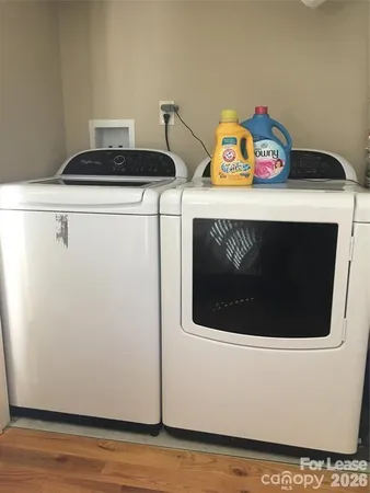 a utility room with dryer and washer