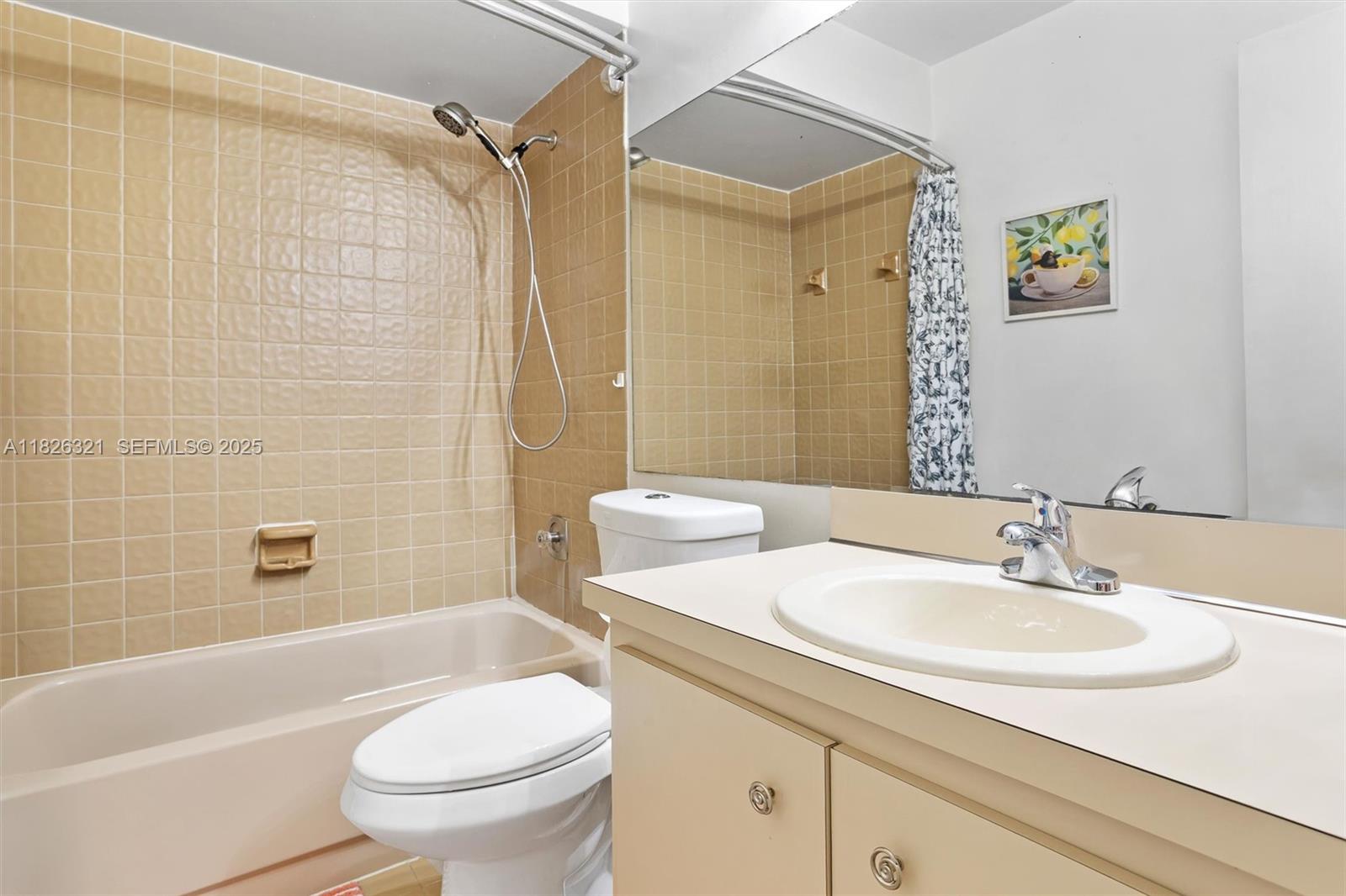 50 Forest Circle Cooper City, FL 33026 - Photo 10 of 22 a bathroom with a sink a toilet and shower