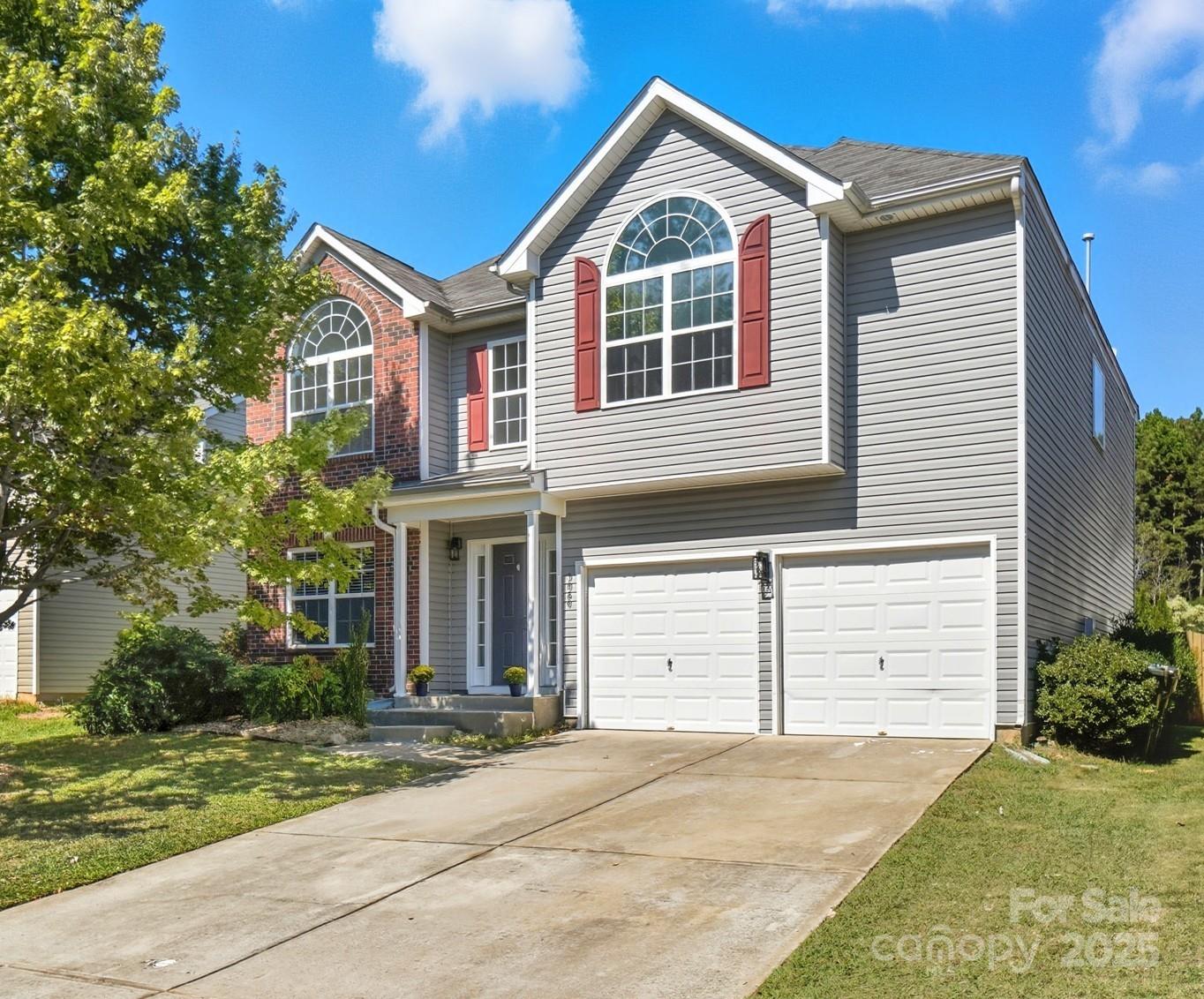 3060 Rocket Road Rock Hill, SC 29732 - Photo 1 of 31 a front view of a house with a yard and garage